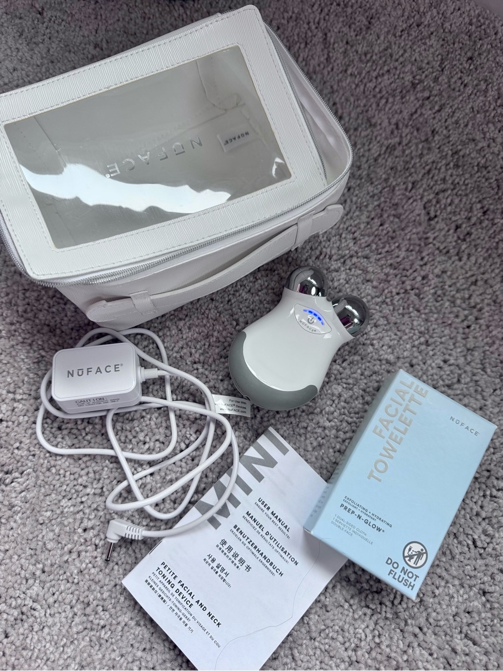NuFace Mini Facial Toning Device with White Carry Case and Silver Rollers